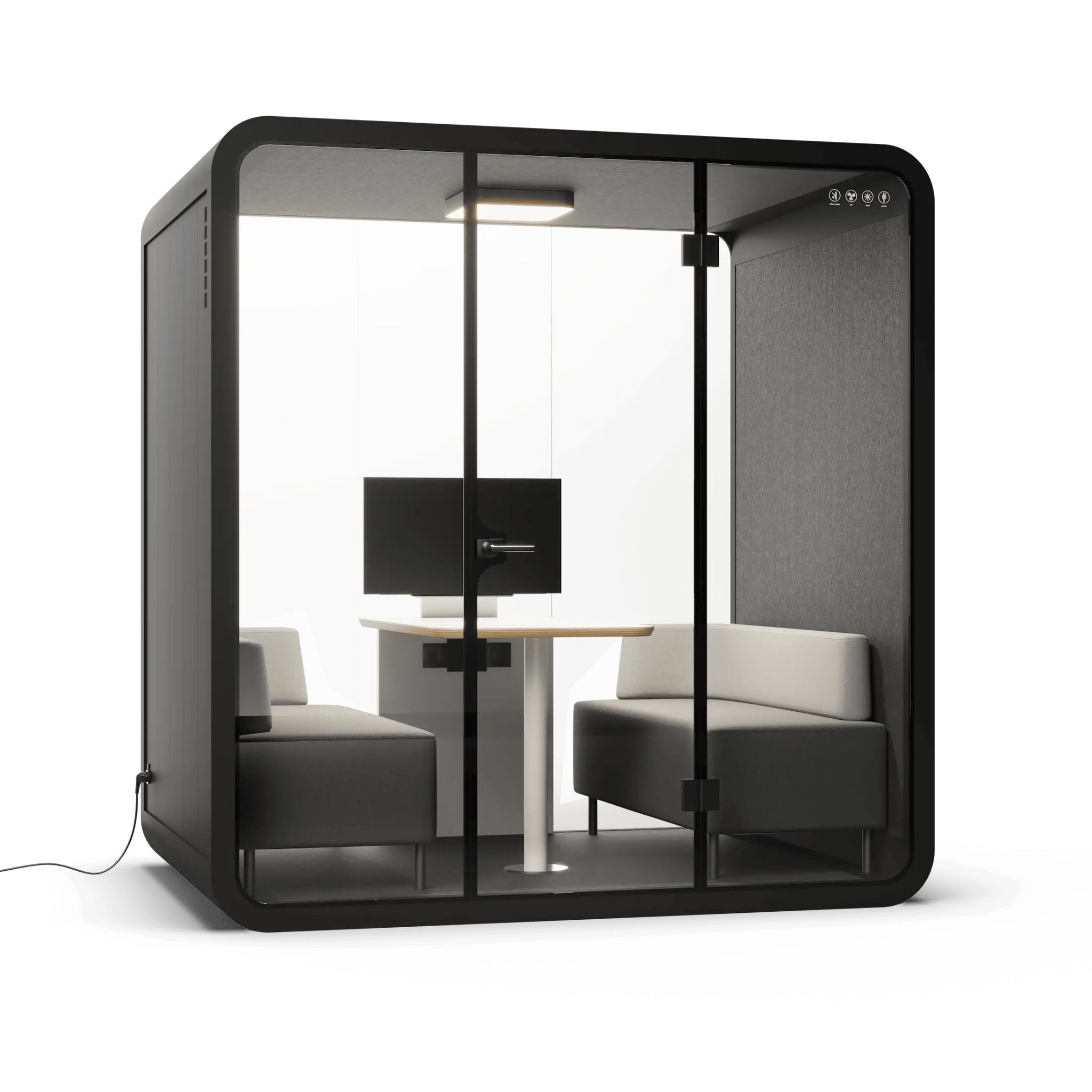 Angle view of a modern 4 person office pod with glass walls, black frame, and minimal furniture on a white background